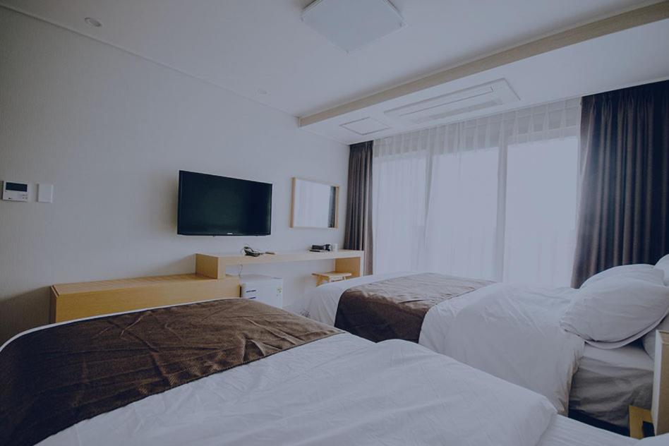 Jeju Lavender Hotel Seogwipo Bagian luar foto